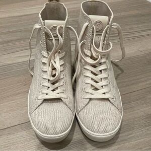 Michael Kors Cream/Gold Sparkling High Top Sneakers in a Size 6.5.
